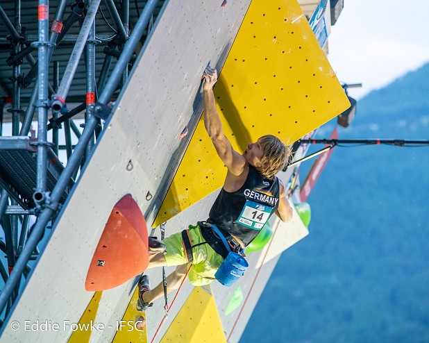 Alex Megos focused on the last few moves of the final route.  © Eddie Fowke/IFSC