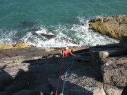 Black Slab, Porth Uwch. Passing the overhang on the right.