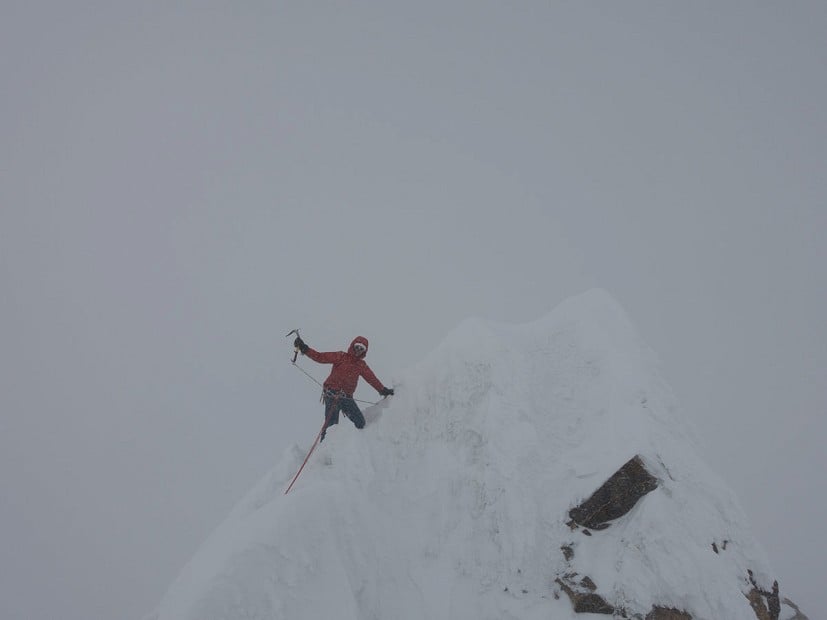 Tom on the summit.  © Luka Strazar