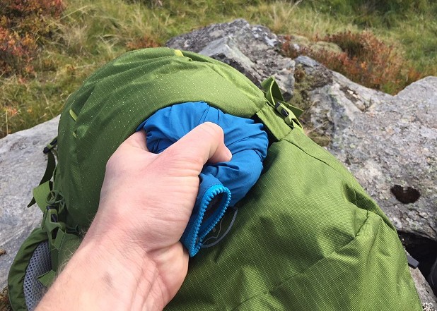The stretch front pocket is a good place to stash a rain shell for quick access  © Dan Bailey