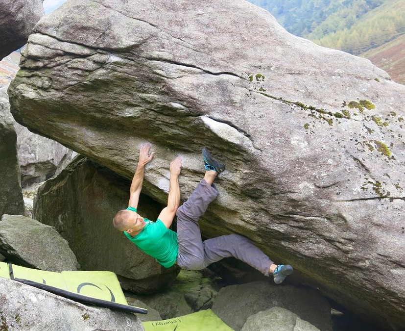 Heel-hooking on a sloping break is the default technique for countless steep boulder problems, such as this classic at Glendalough in Ireland.  © Neil Gresham Col.