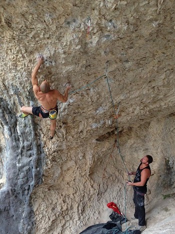 Tufas can provide golden opportunities for compression heel-hooking if you're on the prowl. Here the author slots one in on Welcome to Tijuana 8b+/c, Rodellar, Spain.  © Neil Gresham Col.