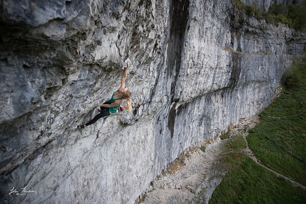 Mina pulling through the steepest section of Raining Bats and Dogs 8c.  © John Thornton