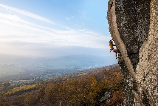 Ethan Walker climbing Janus on a beautiful autumn day.  © Jonathan Bean
