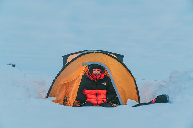 Alex Honnold seeks refuge in his tent.  © The North Face