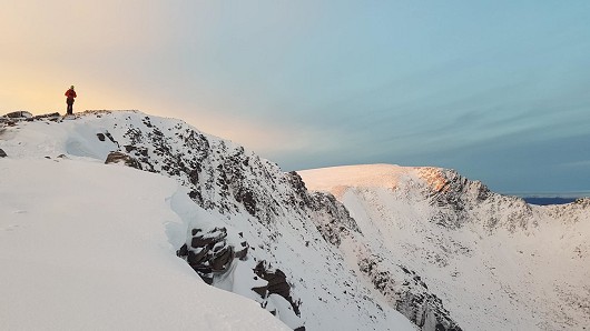 Topping out Hidden Chimney to a sunrise with Fiacaill Ridge looking rather lovely in the background.  © LukeWawrzyniak
