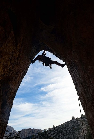 Leo climbing Out of the cave ojo de odra (6c)  © Joy Seward