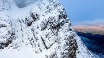 Climbers finishing up the Curtain IV,5 on Ben Nevis before the thaw