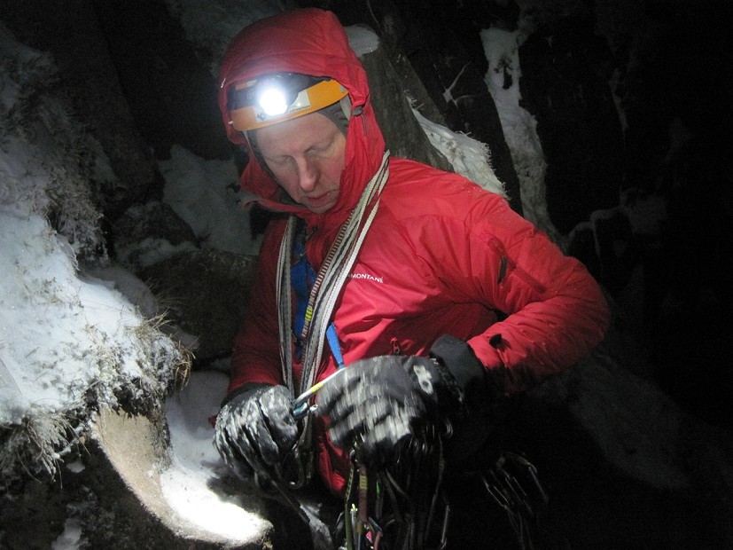 Simon racking gear prior to a nighttime lead on a new route at Beinn Bhann.  © Malcolm Bass