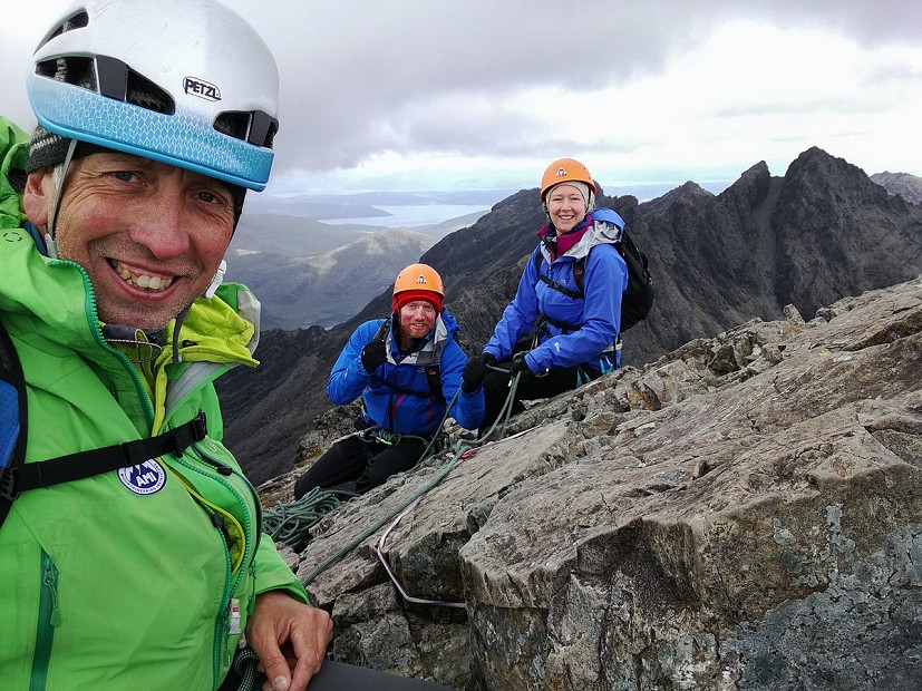 Working with clients on the top of the Inaccessible Pinnacle  © Graham Uney