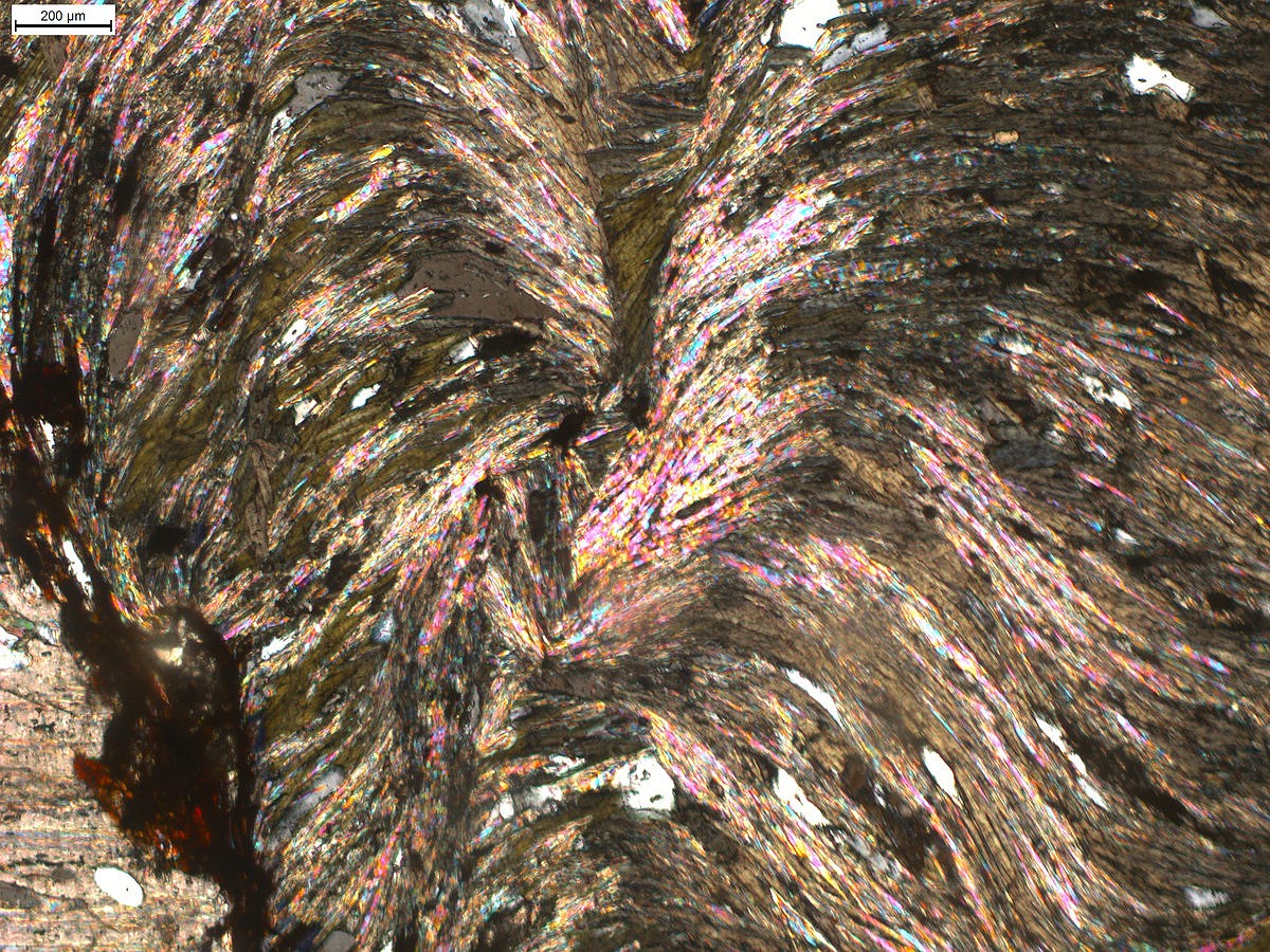 Psychedelic colouring and layering within a schist.   © UKC Articles