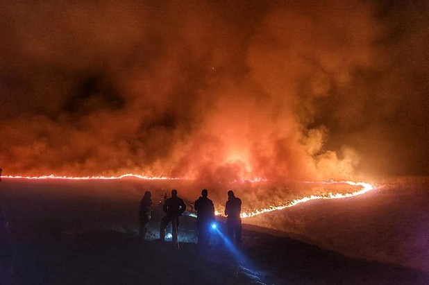 The Marsden Moor fire, pictured on Sunday night  © WYFRS Skelmanthorpe Station