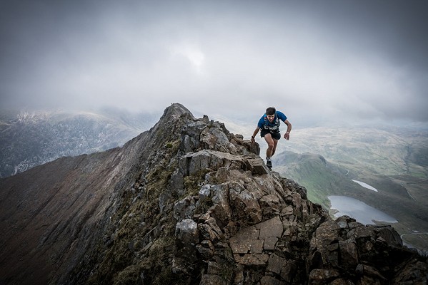 Neil Talbott tackles the infamous Crib Goch ridge on day one of the 2017 Berghaus Dragon's Back Race  © @iancorless
