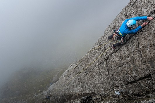 Jade making her way up Botterill's Slab in the cloud.  © JohnHartley
