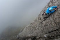 Jade making her way up Botterill's Slab in the cloud.