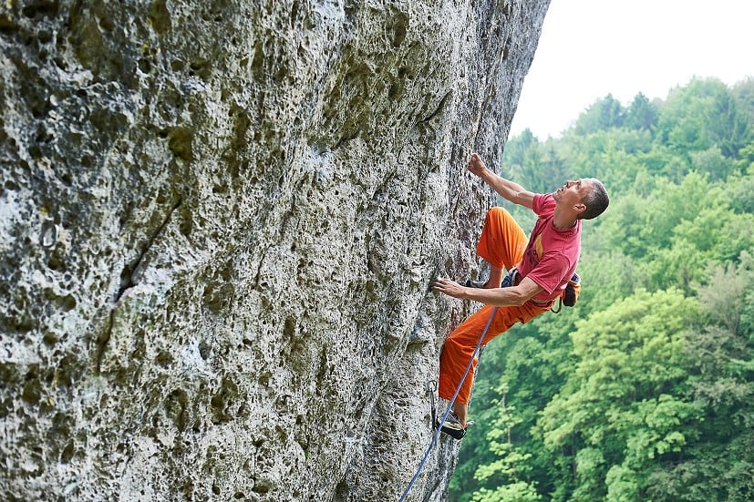 Look before you reach. Steve McClure scans the handholds during an onsight in the Frankenjura.  © MARMOT / Christian Seitz