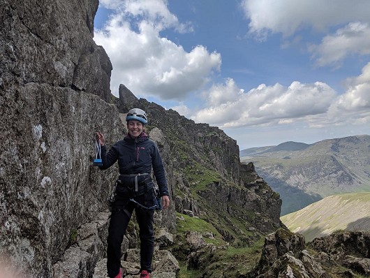 Lisa with her prized nut below Central Buttress, Scafell  © Joe Browns/The Climbers Shop