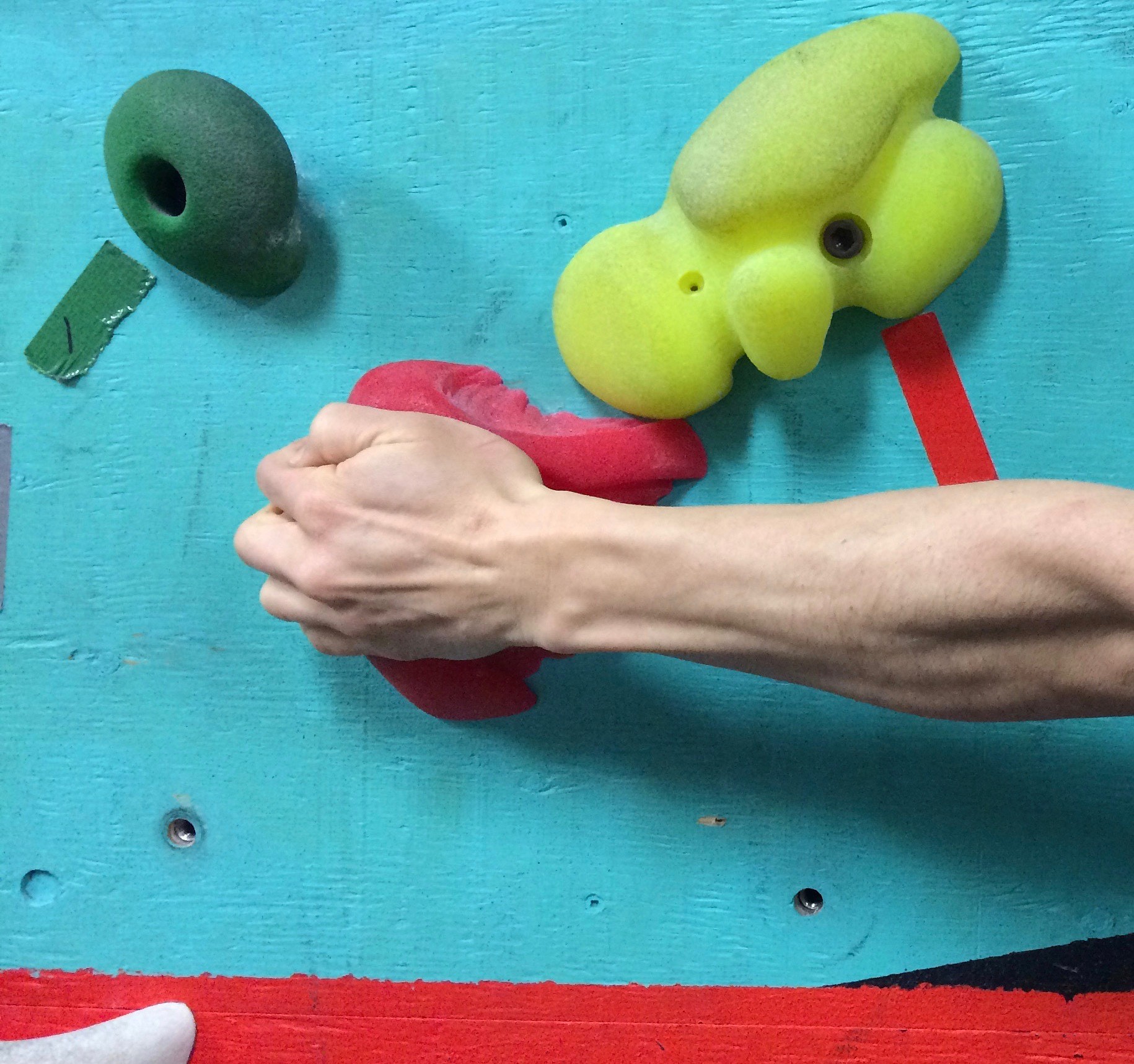 Full strength can only be applied to a side-pull when the forearm is perpendicular to the hold.  © www.climbingphysiotherapy.com