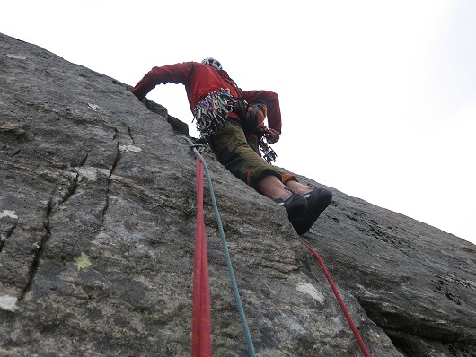 Getting established beneath the flake of Glass Slipper - absorbing climbing  © Alex Reid
