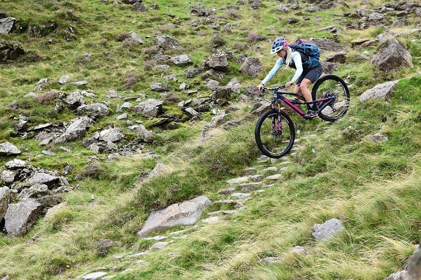 Meg Whyte descending Scarth Gap into Ennerdale.  © Henry Iddon
