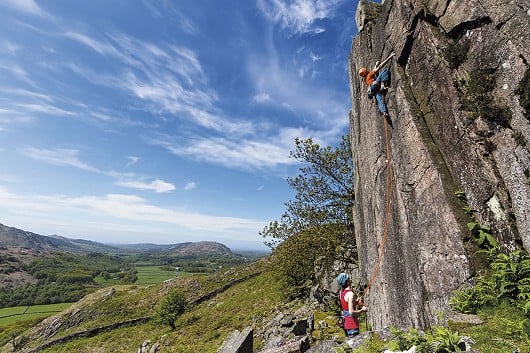 Chris Prescott on the well-travelled crack Plumbline (VS) at Bell Stand (from the Lake District Climbs Rockfax).  © Chris Prescott