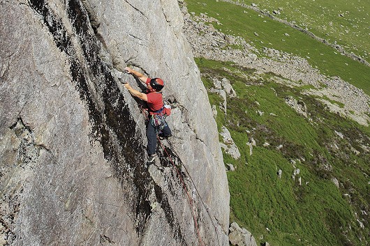 Marti Hallett on the tricky mid-section of Samson (HVS) at High Crag (from the Lake District Climbs Rockfax).  © Mike HUtton
