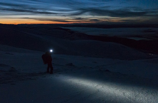With a long, cold night on the way you'll want to be sure you've got enough torch power in your pack  © Dan Bailey