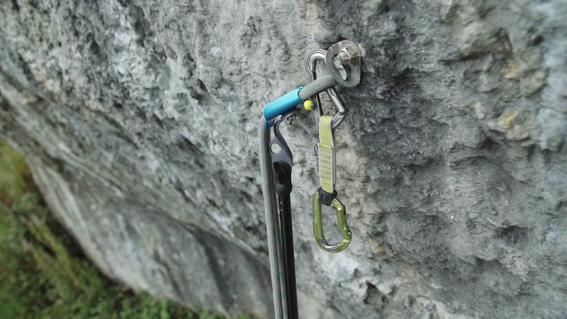 Unclipping a quickdraw from the bolt  © UKC Gear