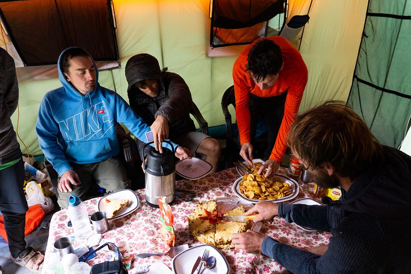 Enjoying a team meal in Base Camp.  © Tom Livingstone