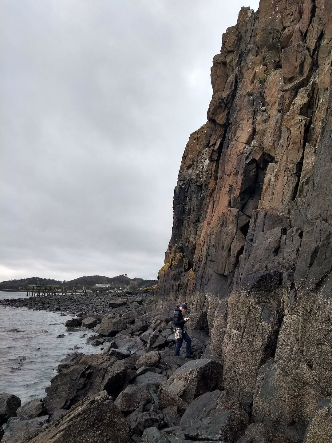 Moving around the dolerite pillars, we find our way up orange-grey slabs, dark fissures and crack lines  © Anna Fleming