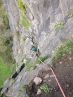 View from above of Martin belaying on platform between P2 and P3 on Morpheus