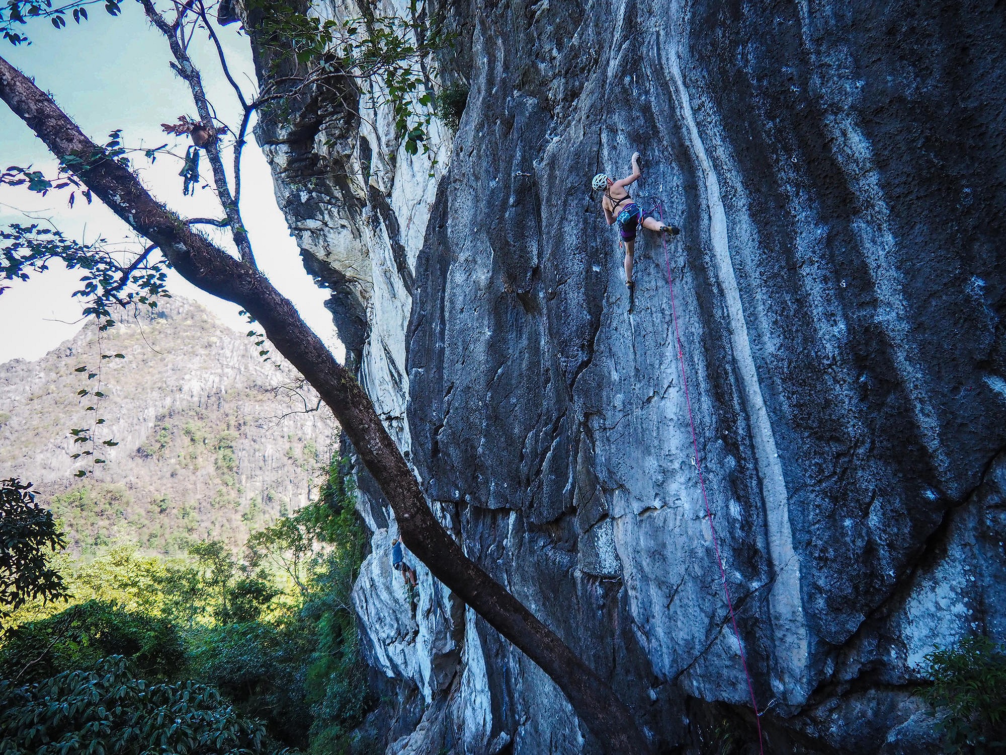 Päivi Hantula makes the most of the all day shade on L4 One of the Best (7a) at Open all Hours sector  © Tom Skelhon