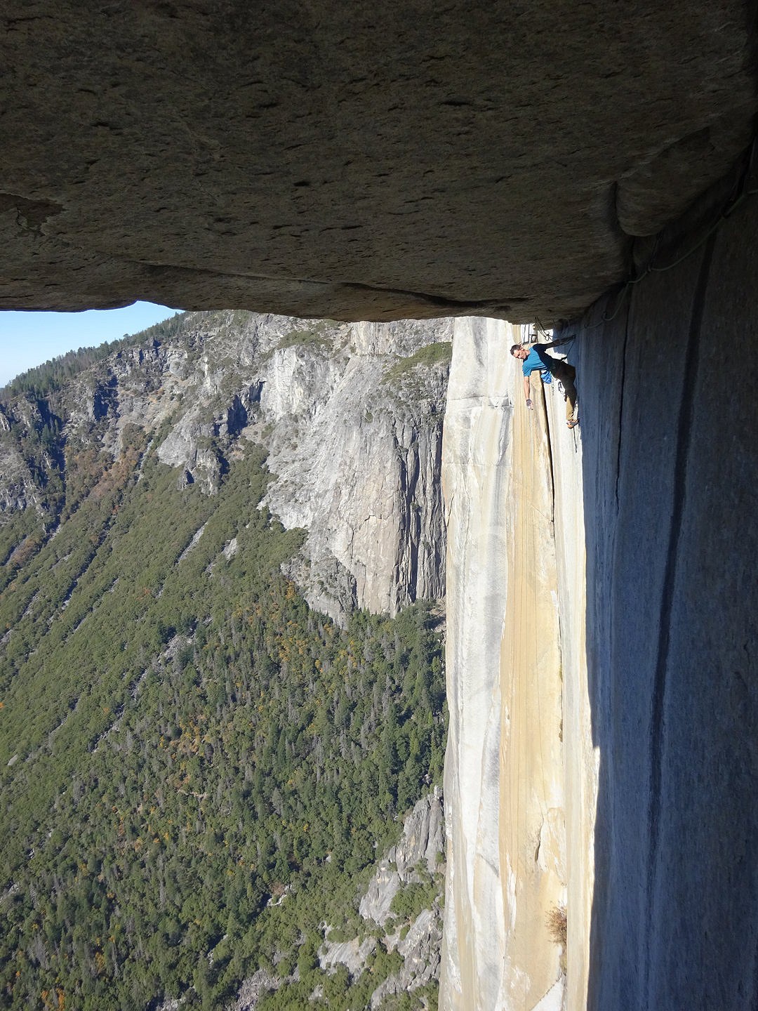 Angus under the crux roof on day 6.  © Dan McManus