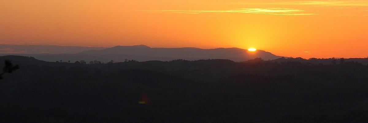 Sunset behind distant Aran Benllyn  © Myrddyn Phillips