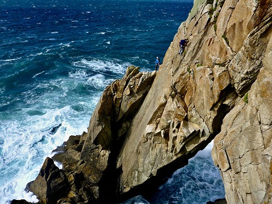 Big Jonnie tackling the 2nd pitch crux on Diamond Solitaire (no easy task at 19 Stones / 83% body fat), Lundy Isle.  © THE.WALRUS
