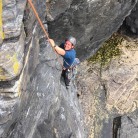 Dave polishing up the finishing moves on the first pitch of Martell Slab, Tater Du crag, Cornwall