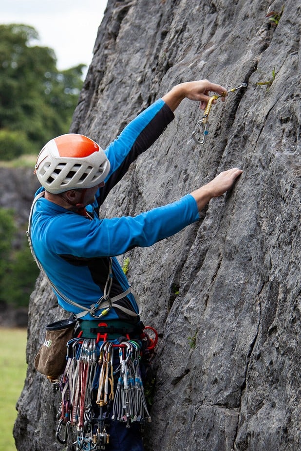 Theo Moore placing an Ultralight Master Cam  © UKC Gear