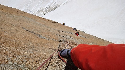 View down the third pitch of Rebuffat. Jed following. Rope team below us doing the crux "S-crack"  © art.gertner