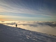 George descending from the Cairngorm summit with a great inversion behind him
