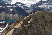 Scramblers on top of Cirque Peak, Ice Fields Parkway, Canadian Rockies.  Bow Lake in the background.  Taken in July 2020.