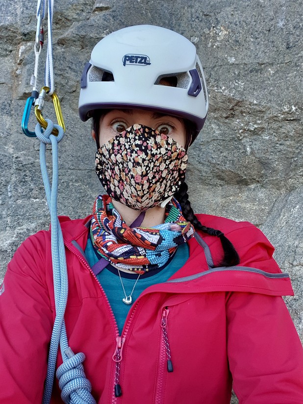 A multi-layered face mask may be useful when sharing a cramped multipitch belay.  © Natalie Berry
