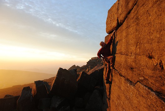 Tom Lewis enjoying the evening light on Stanage  © Mark Leicester