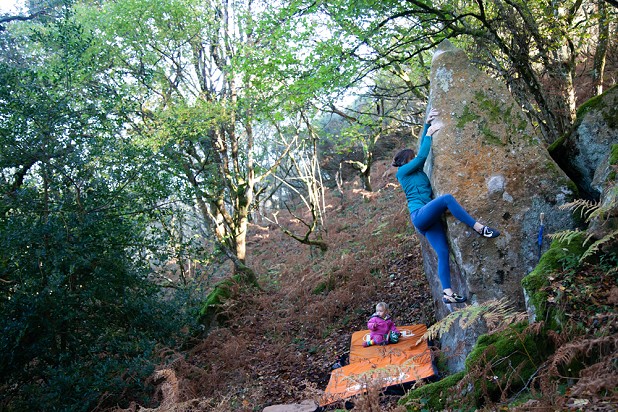 Penny Orr being given an inattentive spot on one of Dartmoor's lesser known classics  © Rob Greenwood - UKClimbing