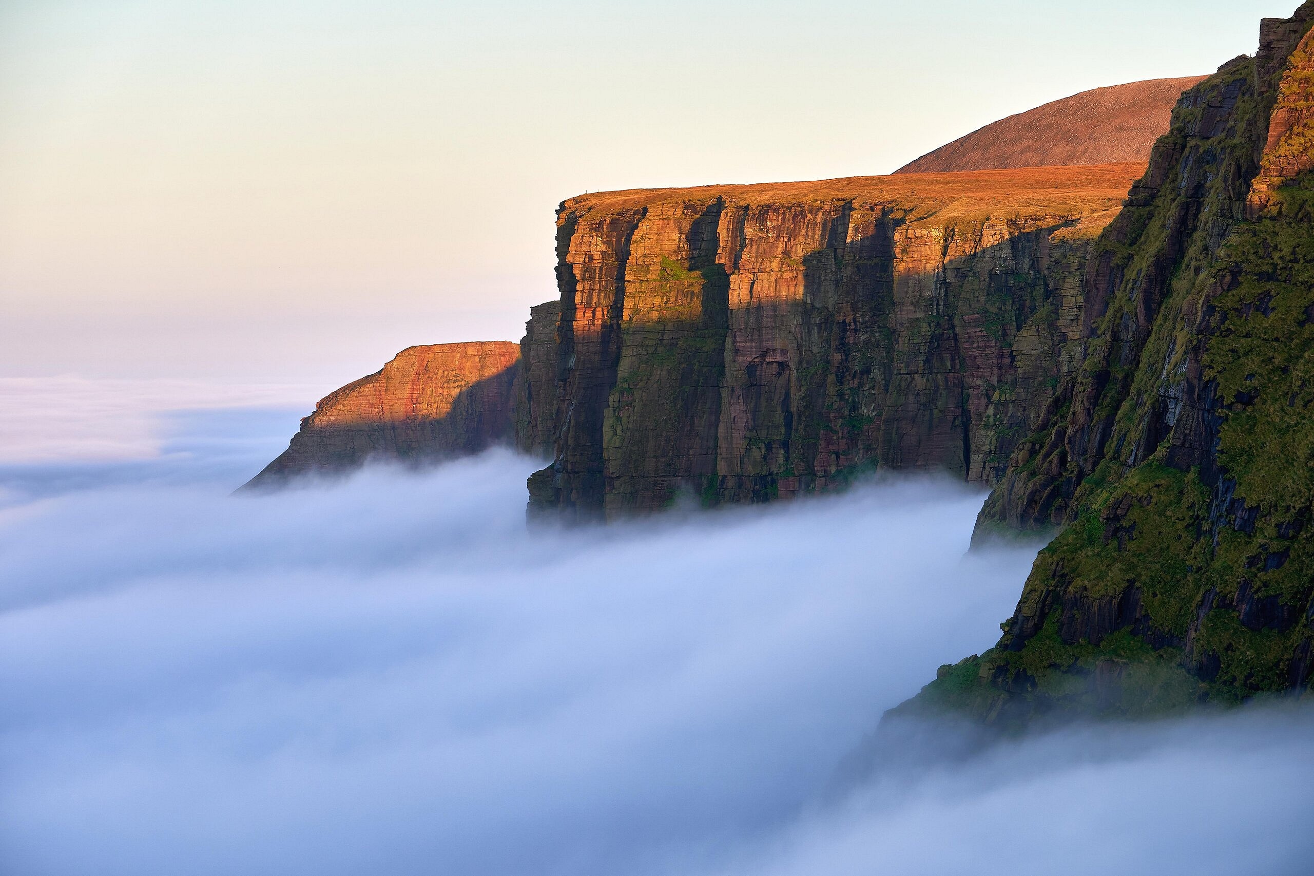A sea of clouds swirl below the cliffs of Cape Wrath  © Hamish Frost