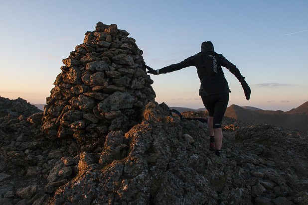 Nicky Spinks on the summit of Raise at dawn, on her double Bob Graham epic  © Dan Bailey