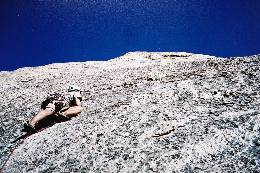 The author experiencing the friction slab of Needlespoon (5.10aR), Tuolumne Meadows  © Toby Dunn Collection