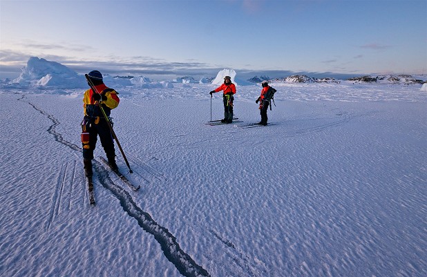 Field Guides journey onto the sea ice and drill through to water  © Ian Hey
