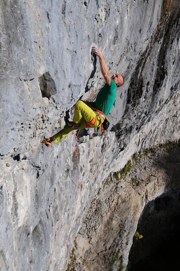 The author on the crux of his 2016 Malham route, Sabotage 8c+. To train for this move, Neil built a replica on his board using a wooden pinch that was the same size and shape. Photo: Ian Parnell  © Ian Parnell