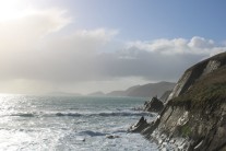 Looking towards Na Blascaodaí with the cliffs of an Dún Mór seen on the right
