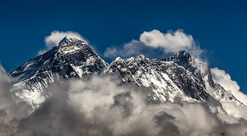 Mountains in the clouds.
Everest, Nuptse and Lhotse from Renjo La.  © Garry Robertson
